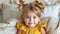 Charming baby girl lying on white bed with soft focus background, creating a delightful scene