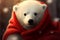 Charming baby polar bear, cozy in a vibrant red scarf