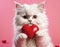 A charming cat holds a vibrant red heart in its small paws, showcasing an endearing image perfect for expressing love