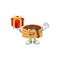 Charming chocolate cream pancake mascot design has a red box of gift