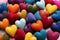 Charming Colorful woolen hearts. Heart craft on table