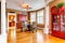 Charming dining room with glass dining table and wicker rustic c