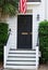 A charming door with flag in downtown Charleston, SC.