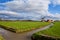 Charming Dutch windmill on green grassland