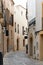 Charming empty cobblestone street of old town of Ibiza Eivissa