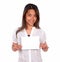 Charming ethnic young woman holding a white card