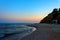 The charming evening landscape of the Black Sea and the lunar sky over it