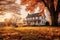 A charming farmhouse surrounded by vibrant autumn trees, showcasing the idyllic beauty of rural landscapes during the fall season