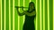 Charming female flutist in a black dress against a background of bright neon lights in a dark studio. Silhouette of a