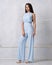 Charming female model in blue jumpsuit