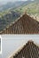 Charming Frigiliana village on the Costa del Sol, Spain. Close up detail of the roof of the historic church