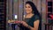 A charming girl standing with a plate of brightly burning Diyas on Diwali