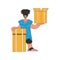 Charming guy holds boxes in his hands. Parcel and cargo transportation.