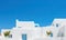 Charming idyllic white building Santorini . Created with AI