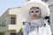 Charming italian woman in Venetian white costume mask dress