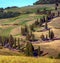 Charming landscape with a car on a curved road with many twists in Tuscany, Italy near Pienza. Excellent tourist places.retro