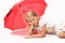 The charming little girl with red umbrella