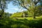 Charming mystical scene with turf roof church in old Iceland traditional style and mystical cemetery in Hof, Skaftafell,