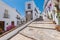 Charming narrow historic streets of white village Frigiliana.