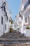 Charming narrow historic streets of white village Frigiliana.