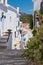 Charming narrow historic streets of white village Frigiliana.