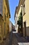 Charming narrow street in the old town of Orosei, Sardinia, Italy