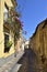 Charming narrow street in the old town of Orosei, Sardinia, Italy