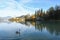 the charming natural scenery of Lake Bled with Alps at background and blue water