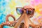 charming octopus in glasses with smart eyes, with tentacles that spread across. Funny octopus wearing sunglasses in studio with a