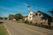 Charming old rural house made of wood aside road