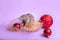 Charming pet. Decorative rat Dumbo on lilac background. Christmas toys. Year of the rat. Chinese New Year