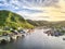 Charming Petty Harbour with green hills and wooden architecture, Newfoundland, Canada