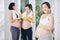 Charming pregnant Asian woman