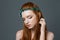 Charming redhead woman with hoop on her head