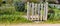 Charming rustic wooden fence of a small organic village backyard