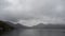 Charming scene of Chuzenji lake with mountain on cloudy sky background