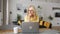 Charming serene carefree s middle-aged blonde woman using laptop for remote work