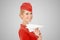 Charming Stewardess Holding Paper Plane In Hand. Gray Background