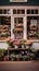 A charming storefront of a flower shop, complete with a quaint sign and colorful flowers