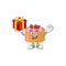 Charming strawberry cream pancake mascot design has a red box of gift