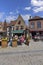 Charming street in the city center with characteristic colorful tenement houses, Bruges, Belgium