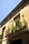 Charming streets of Lecce. Balcony flowery against blue sky. Lecce, Puglia, Italy