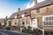 Charming streets of old English traditional stone cottage. Selective focus, copy space.