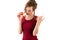 Charming teenager girl in red dress with nectarine in hand