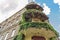 Charming view of an ancient house with green balconies