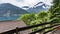 Charming view of the mountain lake Ledro from a hiking path in the mountains. Postcard overlooking the mountain lake Ledro and the