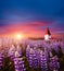 Charming view of Vikurkirkja christian church. Location place Vik i Myrdal village, Iceland, Europe