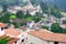 Charming village of Guapolo in Quito Ecuador with houses built downward valley, spectacular view Andes mountains