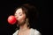 charming vintage style woman blowing red