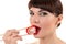 Charming woman eating roll with red caviar